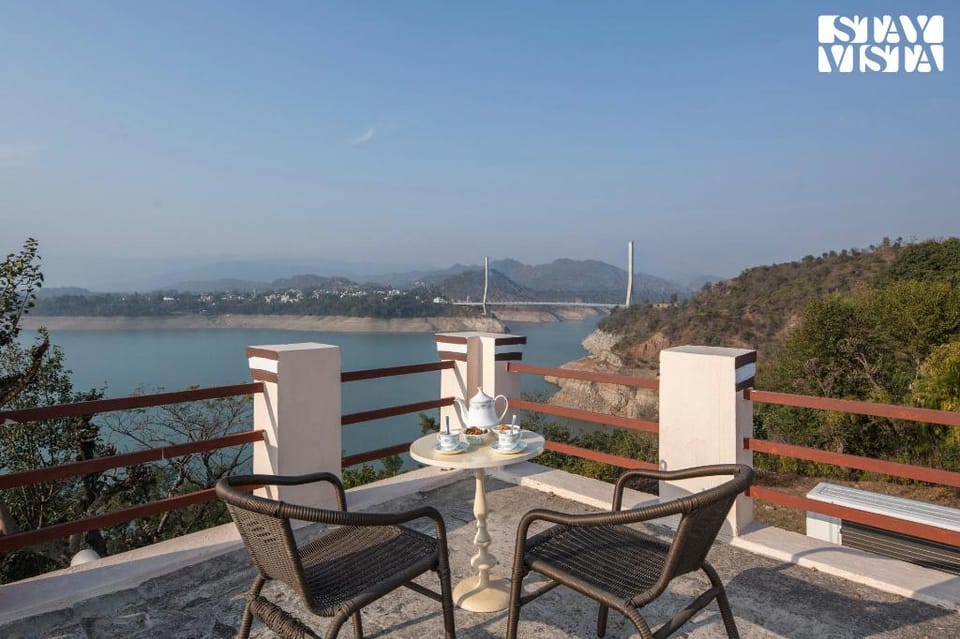 StayVista's Lake Pearl Serenity - Riverside, Mountain-View Villa with Jacuzzi, Sprawling Lawn & Terr Villa in Punjab, India