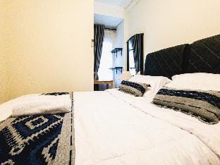 Homey 2 Bedroom Space – 7 Min Walk to LRT Apartment in Jakarta