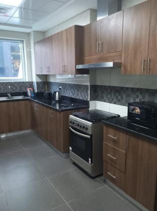 Suite Room with Kitchen|Patio Garden|Pool|Parking Vacation rental in Dubai