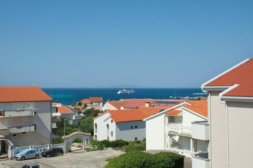 Apartments Summersong Garden View 5 Vacation rental in Novalja