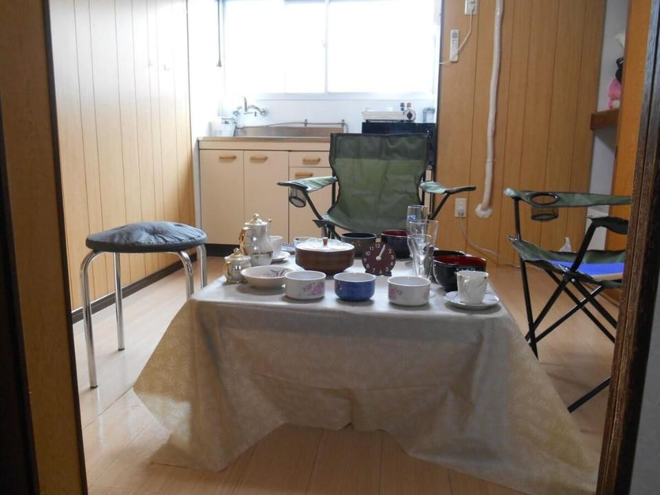 Pet-friendly and close to USJ and Expo site. Log cabin-style room with wood accents. Vacation rental in Osaka