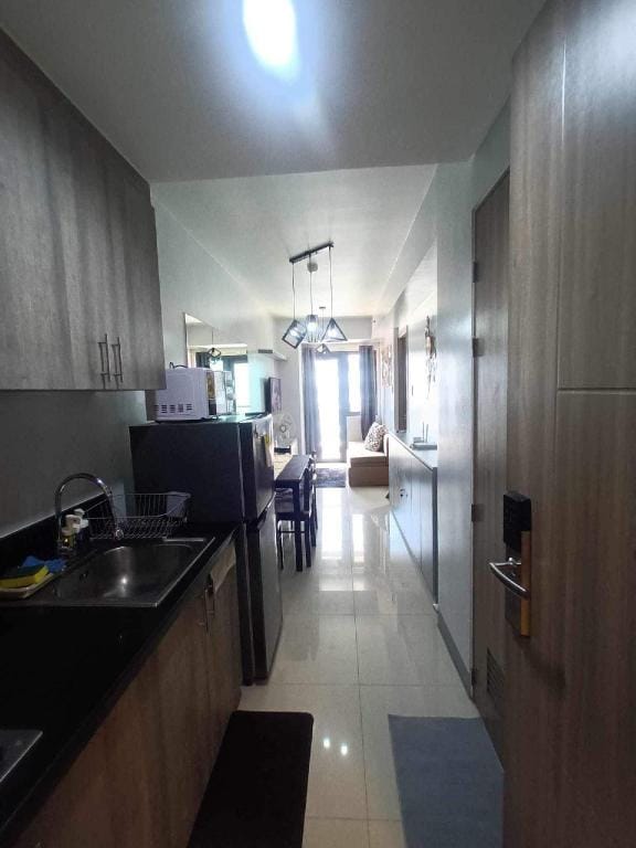 Staycation near MOA  by Cozypura with Pay Parking Apartment in Pasay