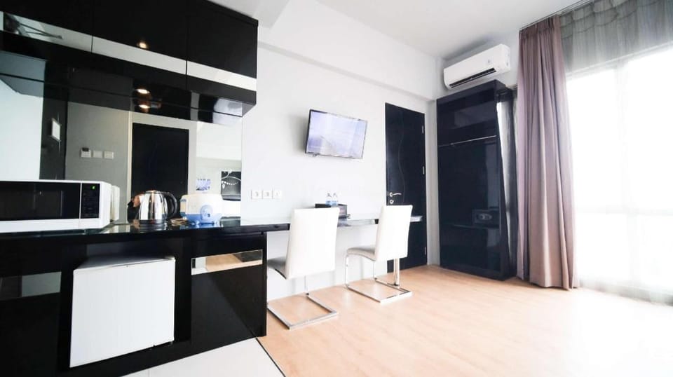 Studio NoKitchen Grand Darmo Suite Apt By Travelio Apartment in Surabaya