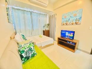 Beach + Pool 1br w/3beds Wi-Fi Apartment in Lapu-Lapu City