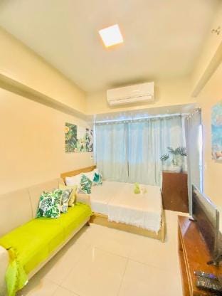 Beach + Pool 1br w/3beds Wi-Fi Apartment in Lapu-Lapu City