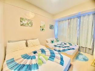 Beach + Pool 1br w/3beds Wi-Fi Apartment in Lapu-Lapu City