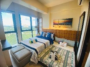 Beach + pool access 1br&2beds Apartment in Lapu-Lapu City