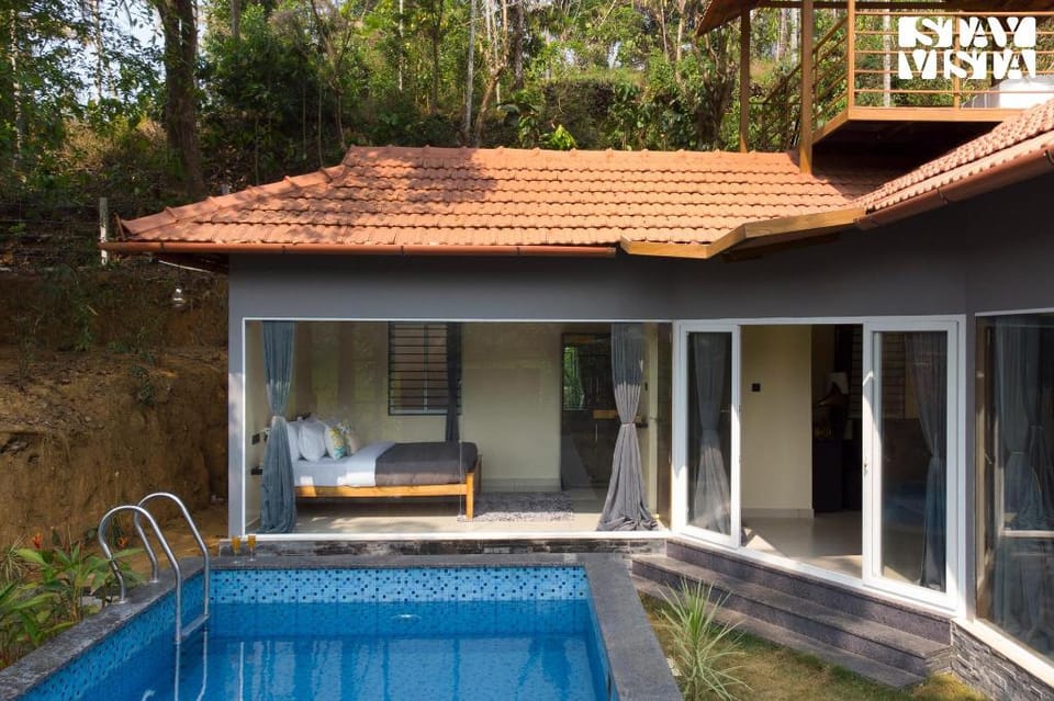 StayVista at Palm Tree Homes with BBQ Grill & Pet Friendly Home Villa in Kerala