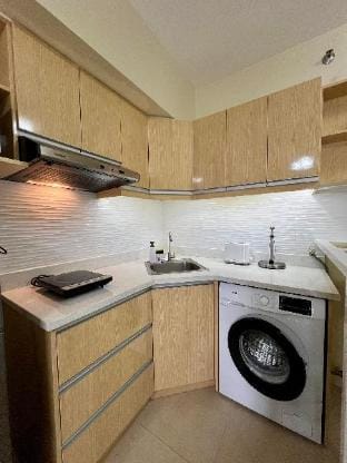 Woodland Whitespace Studio Apartment in Lapu-Lapu City