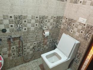 Yellow petals comfortable Room 301 Vacation rental in Mysuru