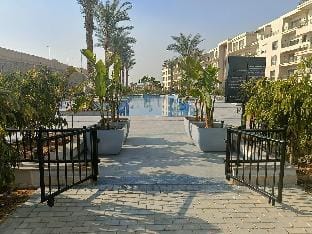 Carrara White 3BR APT W/Garden view and Pool Apartment in Cairo