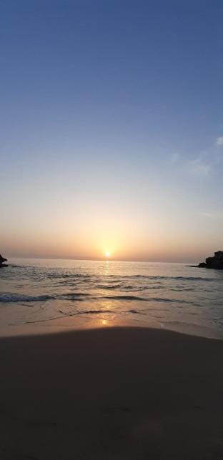 Beach Sunset Magic! (+961 76 35 36 10) Apartment in Africa