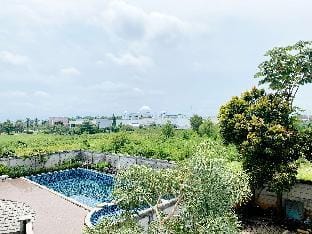 Modern Look and Homey Studio at Enviro By Travelio Apartment in West Java