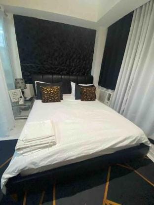 Azure skyview 1BR netflix karaoke ps3 Airport Apartment in Paranaque