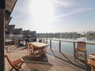 Villa with terrace on the water in Friesland Villa in Friesland, Netherlands