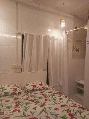 White Den part of bungalow Apartment in Mumbai