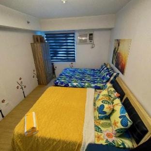Mplace Tower B(2 beds) #60 Vacation rental in Quezon City