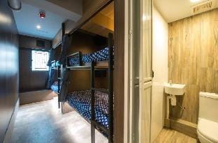 Room for 6-8 people (bunk beds) at Exit B1, Jordan MTR Station Apartment in China