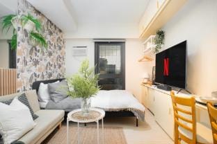 Fully Furnished : Urban Oasis Free Pool in QC Apartment in Quezon City