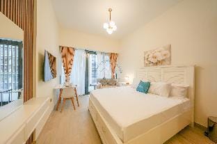 Serene Riviera Studio | Sunlit Escape in MBR City Apartment in Dubai