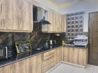 Zaha Homes-Grand 3BR apt by SNL,Shaheede Millat Rd Apartment in Karachi