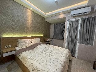 Urban Heights Residences by DR Rooms Apartment in Jakarta
