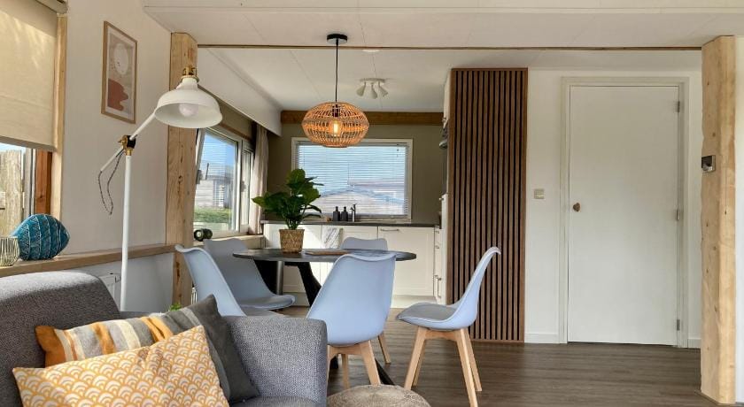 2 pers. house Knig lakeside of the Lauwersmeer with own fishing pier Sauna Chalet in Anjum