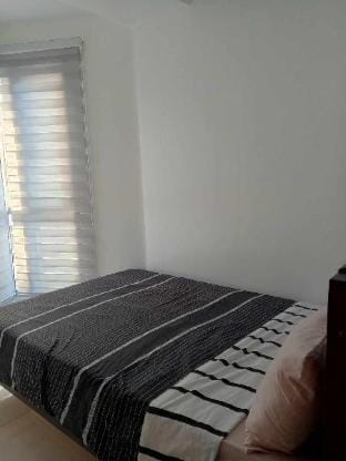 Condo in Grand Riviera 2BR Room INFRONT US EMBASSY Apartment in Manila City