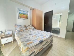 Unwind & Relax with a Sunset View at The Palladium Apartment in Iloilo City