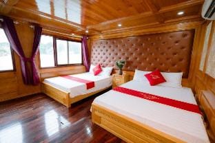 Cat Ba Gem Cruise Docked boat in Laos