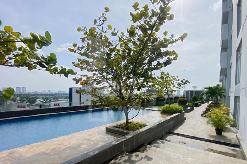 RedLiving Apartemen Treepark City - Nuansa Property Tower Alpine Apartment in West Java