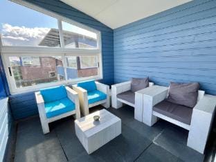 6 pers. Modern harbor house with fenced garden with the lake view Vacation rental in Anjum