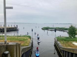 6 pers. Modern harbor house with fenced garden with the lake view Vacation rental in Anjum
