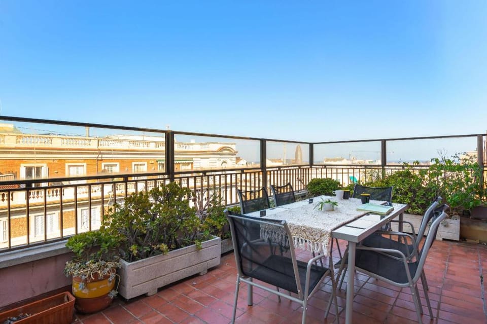 Chic 3BR Retreat with Private Terrace Apartment in Barcelona