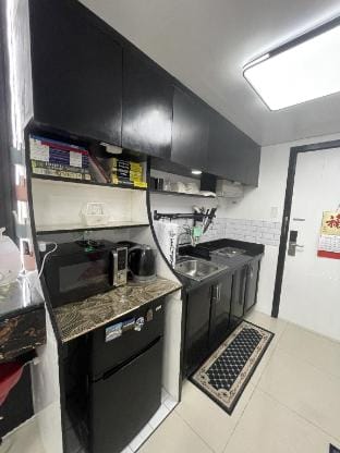Cozy Two 1BR Condo Steps to SM North EDSA and MRT Apartment in Quezon City