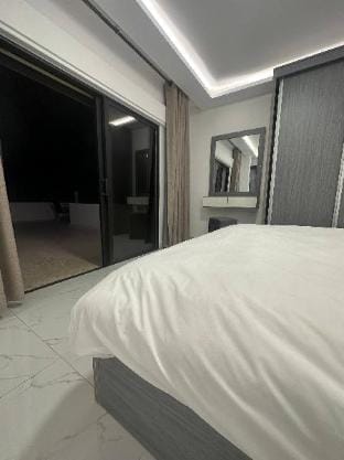 Cozy and Tranquil Rooftop Near Al Services 23 Apartment in Africa