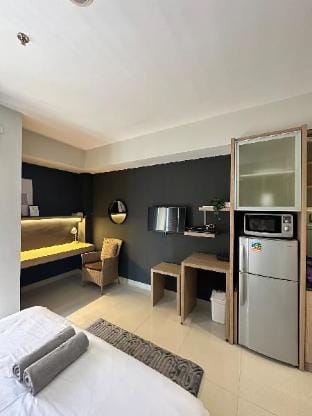 Minimalist Design Room at Atria Residences Apartment in West Java