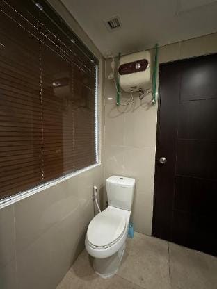 Minimalist Design Room at Atria Residences Apartment in West Java