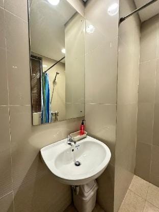 Minimalist Design Room at Atria Residences Apartment in West Java