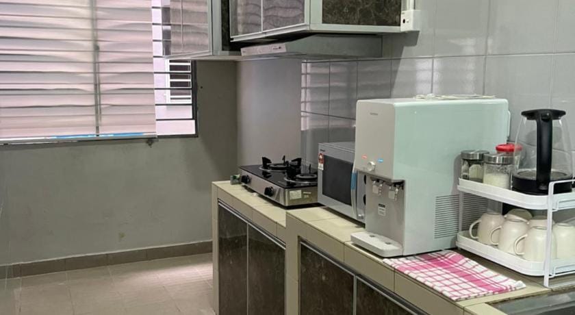 Cozy Home with swimming pool access (ground floor) Apartment in Sabah