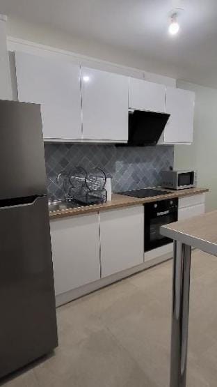 NIA RENT] Grand appartement avec parking privé Apartment in Île-de-France