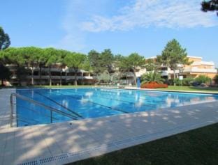 Flat with terrace overlooking the pool - Beahost Apartment in Bibione