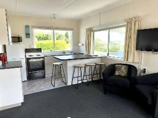 Pohara s Seaside Chalet - Cozy Beach Stay Vacation rental in Tasman District, Tasman, New Zealand