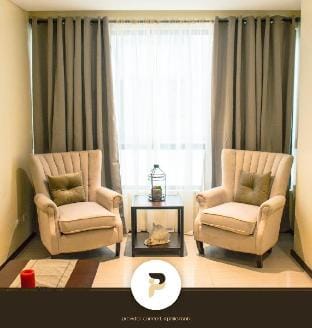 Furnished 1BR with twin beds near Solaire Vacation rental in Pasay