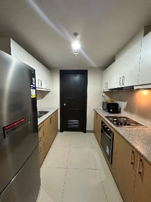 Cityscape Gem: Prime 3BR on the 7th in BGC! Apartment in Makati
