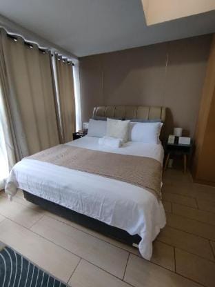 Cozy 1BR Condo in BGC Vacation rental in Makati