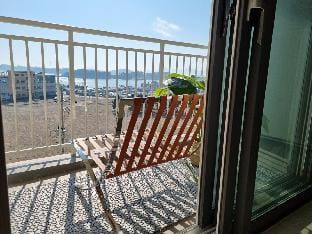 J911 Yeosu Ubless 16-pyeong Deluxe Queen Bed Ocean View Room Apartment in South Korea