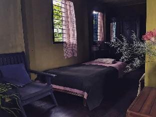 The wooden home by the river with a library Vacation rental in Kien Giang