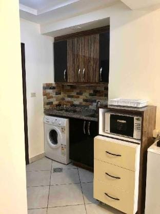 Modern apt central location: steps to all services Apartment in Africa
