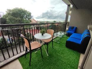 Cozy 1BR w/balcony Netflix WiFi SerinO935 3G3 523O Vacation rental in Tagaytay